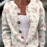 Cardigan con stampa di rose rosa e bottoni