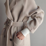 GRACE | Cappotto elegante con cintura strutturata