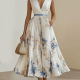 Camilla | Abito midi plissettato in chiffon floreale bianco con scollatura a V