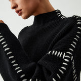 Alma | Maglione oversize con collo alto e dettagli in piqué
