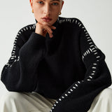 Alma | Maglione oversize con collo alto e dettagli in piqué