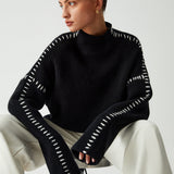 Alma | Maglione oversize con collo alto e dettagli in piqué