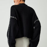 Alma | Maglione oversize con collo alto e dettagli in piqué