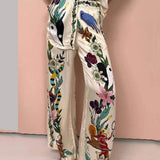 Olimpia | Completo camicia e pantaloni in satin con stampa unica, stile Resort