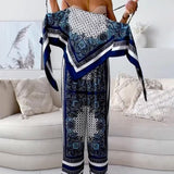 Diana | Set di due pezzi elegante con top a lacci e pantaloni pronti per le vacanze